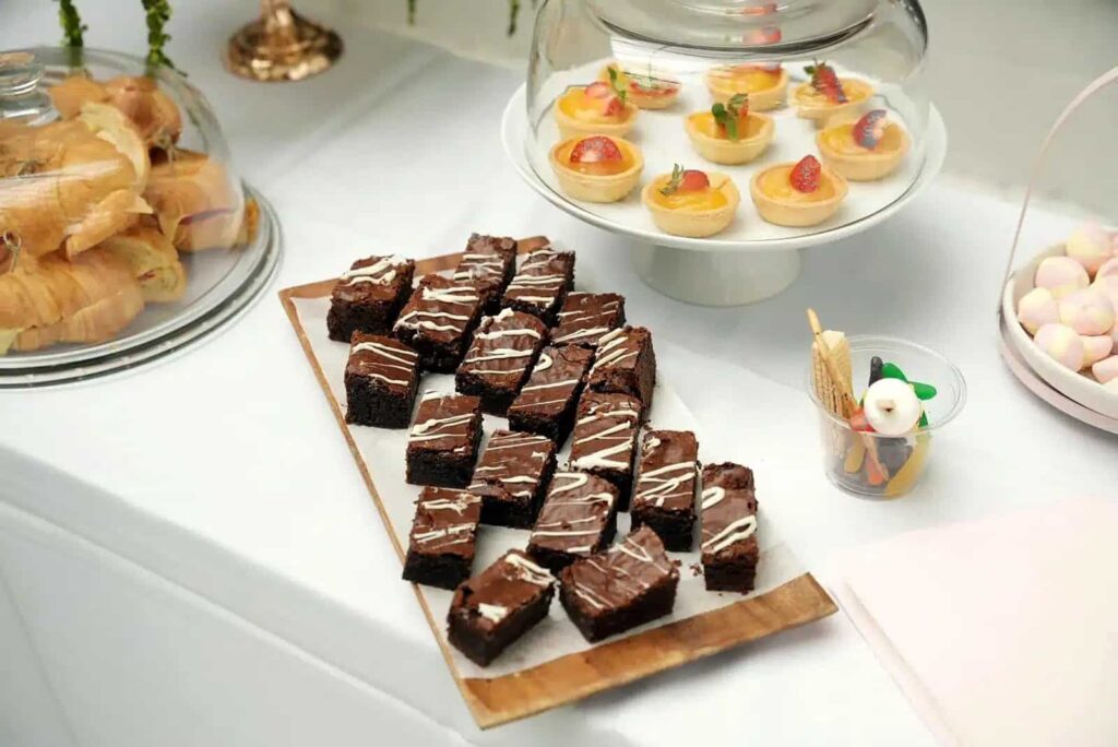 Chocolate brownie bites on a wooden board